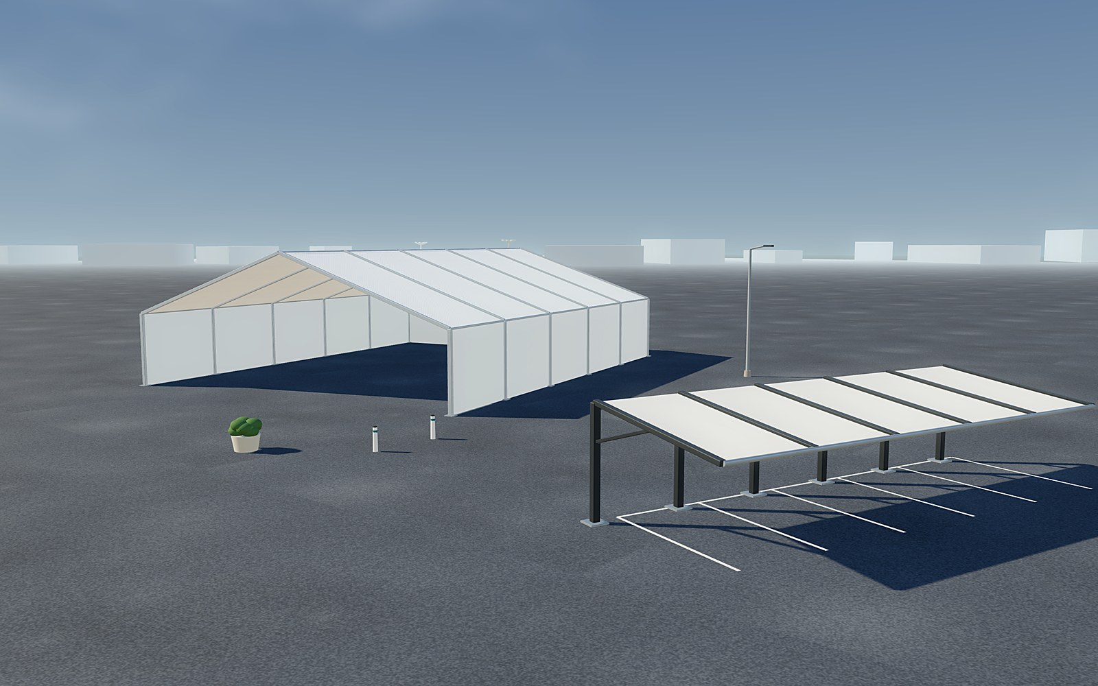 A clear-span aluminium tent and a cantilever car park shade on the same site